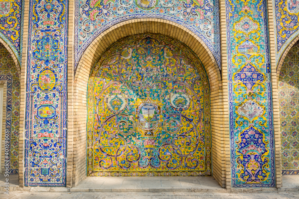 Vintage colorful mosaic ceramic tile wall of the royal Golestan Palace in Tehran, Iran, which is a UNESCO World Heritage site