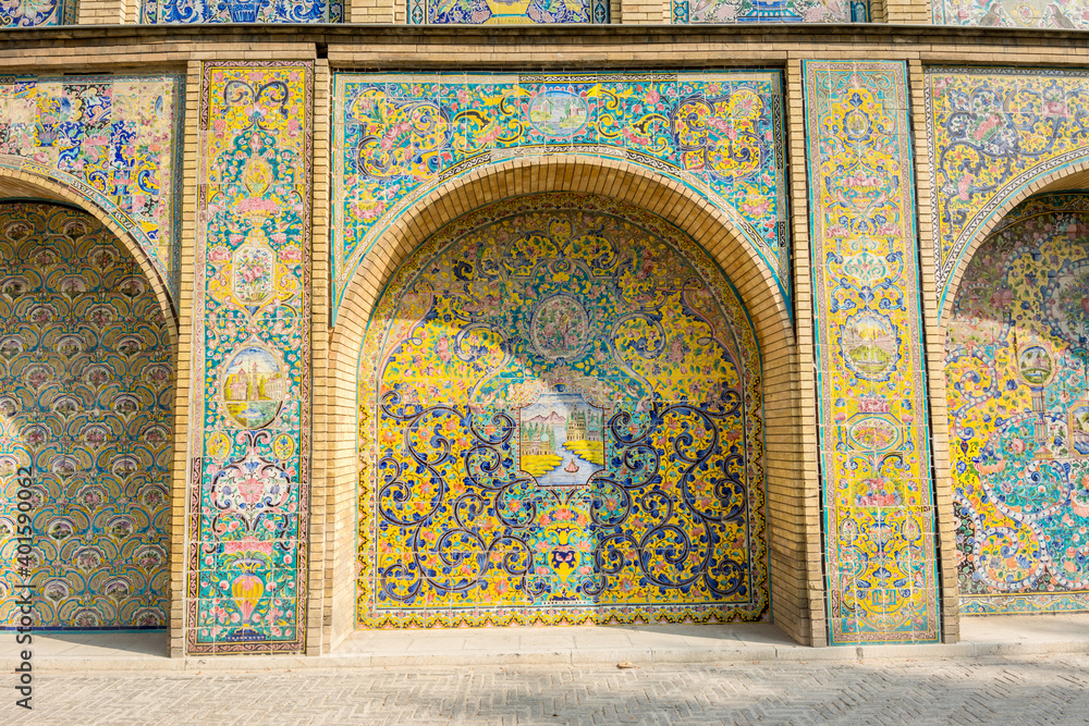 Vintage colorful mosaic ceramic tile wall of the royal Golestan Palace in Tehran, Iran, which is a UNESCO World Heritage site
