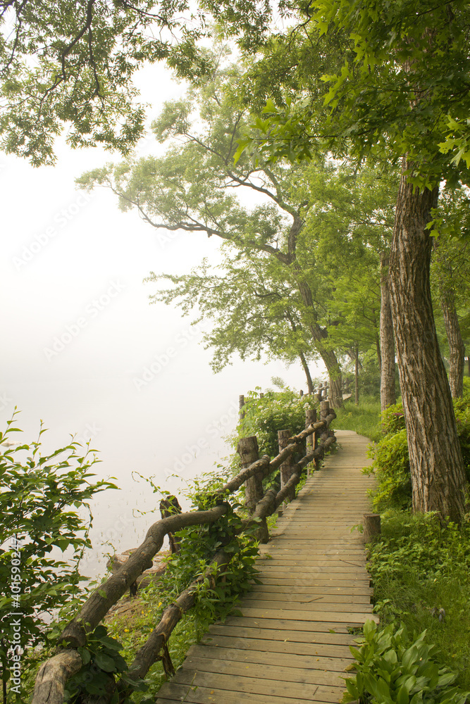 The riverside walkway of the park on Nami Island. The riverside walkway of the park on Nami Island.