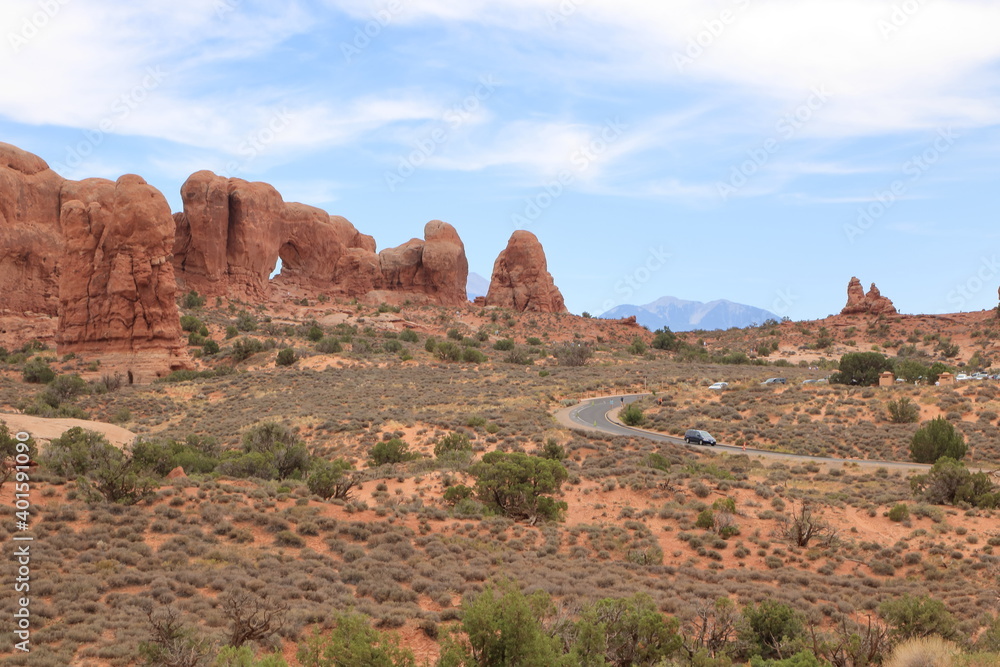 Arches National Park scenic byway winds through sandstone landscapes Arches National Park scenic byway winds through sandstone landscapes