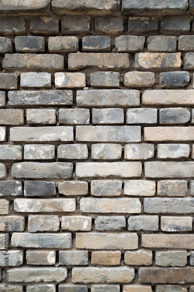 Old gray brick wall background Old gray brick wall background