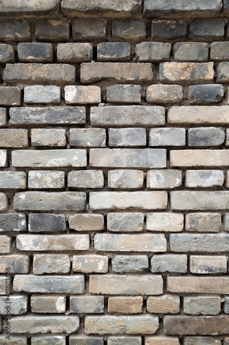 Old gray brick wall background