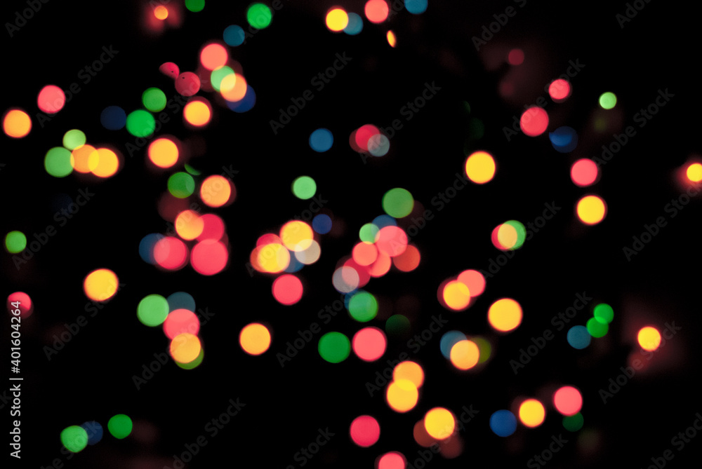Decoration at Happy christmas holiday. Happy new year. Glitter Blue and Orange Soft-Focus Lights Flashing. Focus Features. Lens Bokeh. Flare lights. Dark Background. Close up