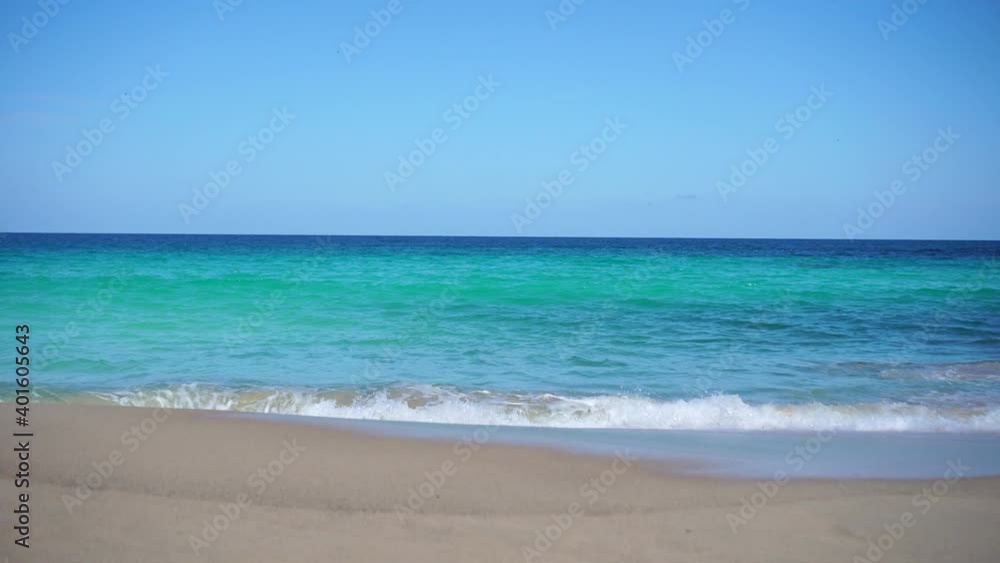 4K video of Summer beach relaxation with bokeh sun light and blue sky. 4K video of Summer beach relaxation with bokeh sun light and blue sky.