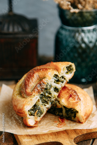 Traditional Moldovan and Romanian cake in the shape of a snail. Swirling round pie close - up in the cut. photo