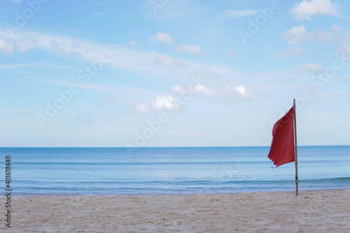 Red flags indicate dangerous areas for swimming in the sea.