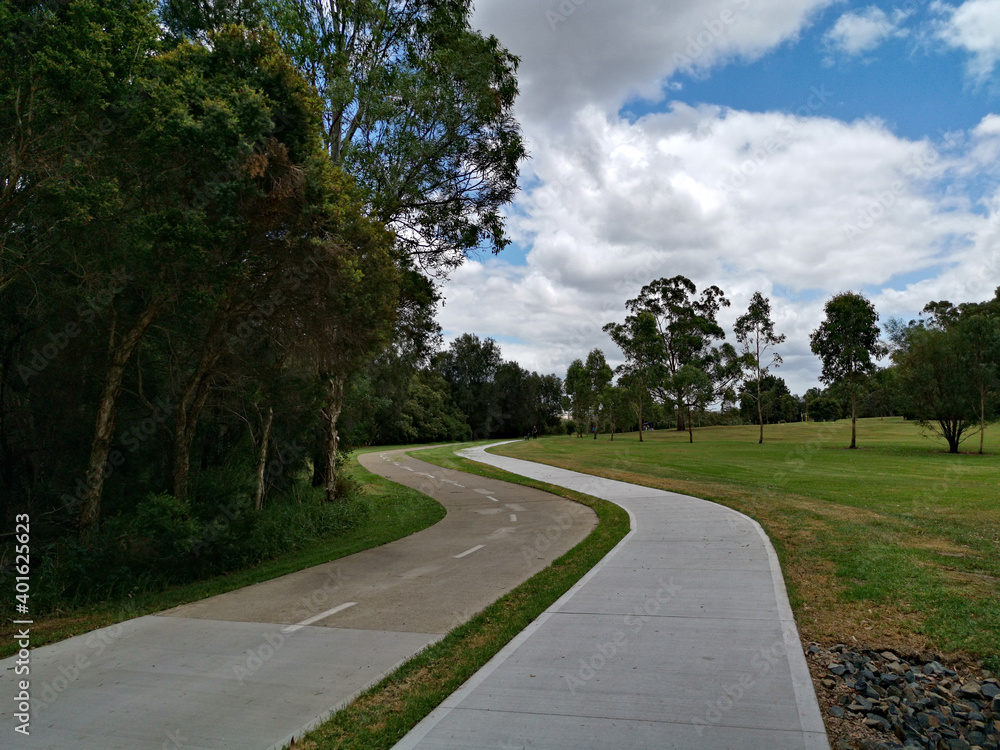 Beautiful view of a park with double trail, cycling and walking trail running along side by side, Rydalmere, Sydney, New South Wales, Australia
