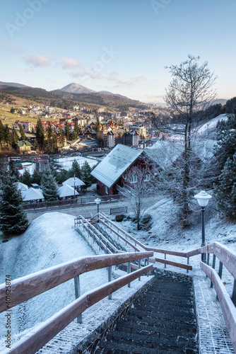 Cottages at a ski resort. Winter street. Winter Ukrainian Carpathians.