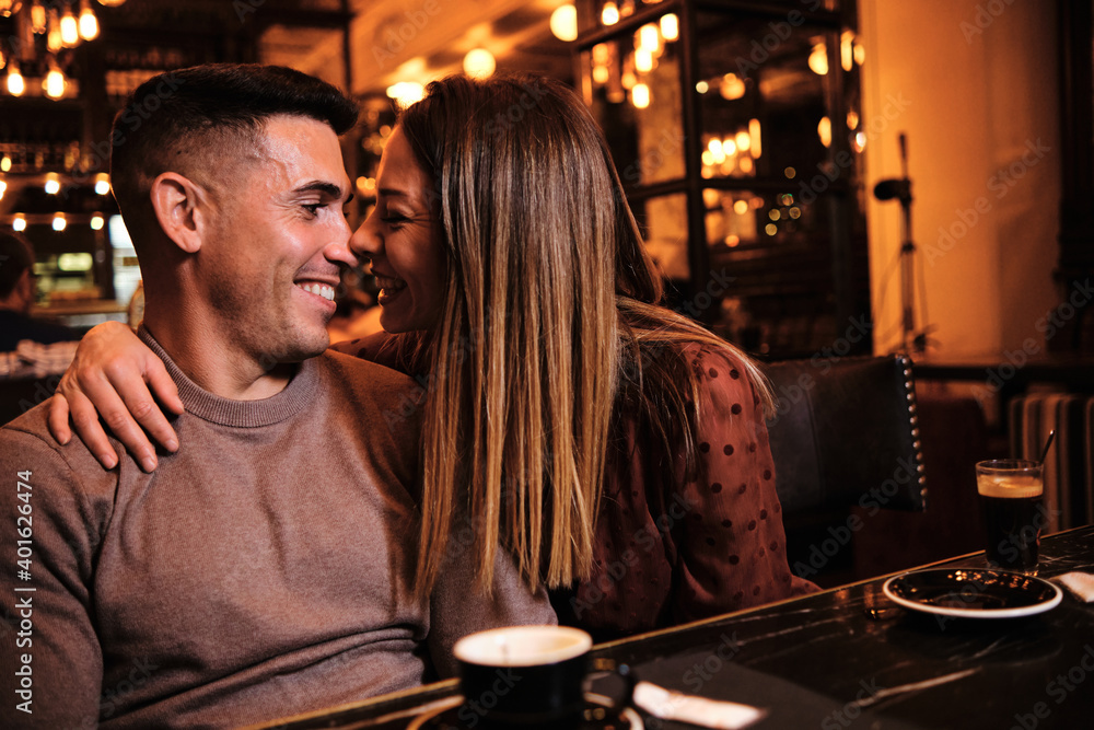Portrait of lovely young couple smiling and looking at each other Portrait of lovely young couple smiling and looking at each other