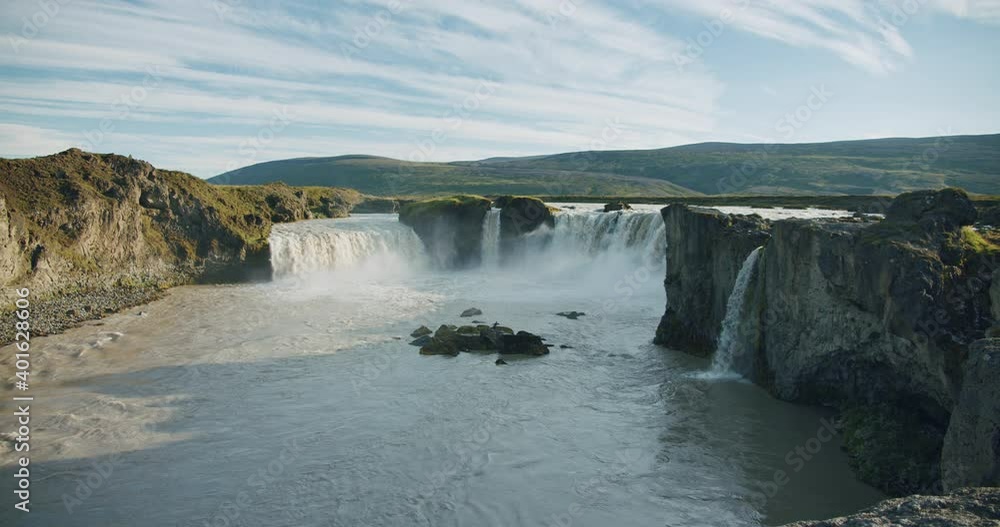 Beautiful cascade Godafoss waterfall in sunset scene, Iceland. Beautiful cascade Godafoss waterfall in sunset scene, Iceland.