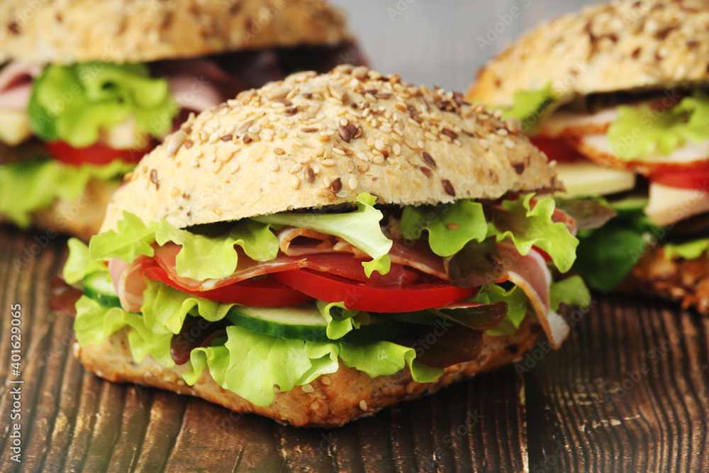 Sandwiches with whole grain bread, ham and vegetables Sandwiches with whole grain bread, ham and vegetables