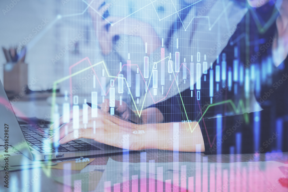 Multi exposure of woman hands typing on computer and financial graph hologram drawing. Stock market analysis concept. Multi exposure of woman hands typing on computer and financial graph hologram drawing. Stock market analysis concept.
