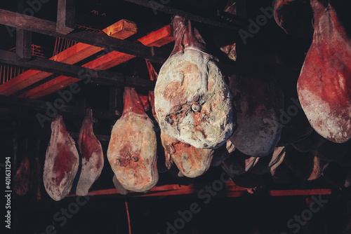 Dried homemade ham in local stores in Njegusi, Montenegro photo