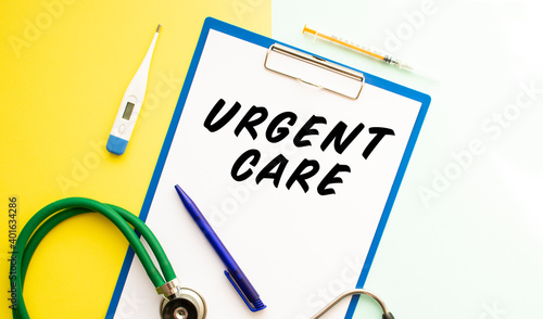 URGENT CARE text on a letterhead in a medical folder on a beautiful background.