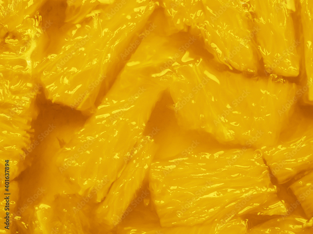Flatlay. Pieces of juicy oranges in a transparent fragrant edible gel. Minimalism in food. Trendy pantone colors of 2021- Illuminating Yellow. Toned creative food background. Copy space. Flatlay. Pieces of juicy oranges in a transparent fragrant edible gel. Minimalism in food. Trendy pantone colors of 2021- Illuminating Yellow. Toned creative food background. Copy space.