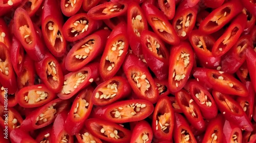 chopped red hod chili pepper. top view rotation photo