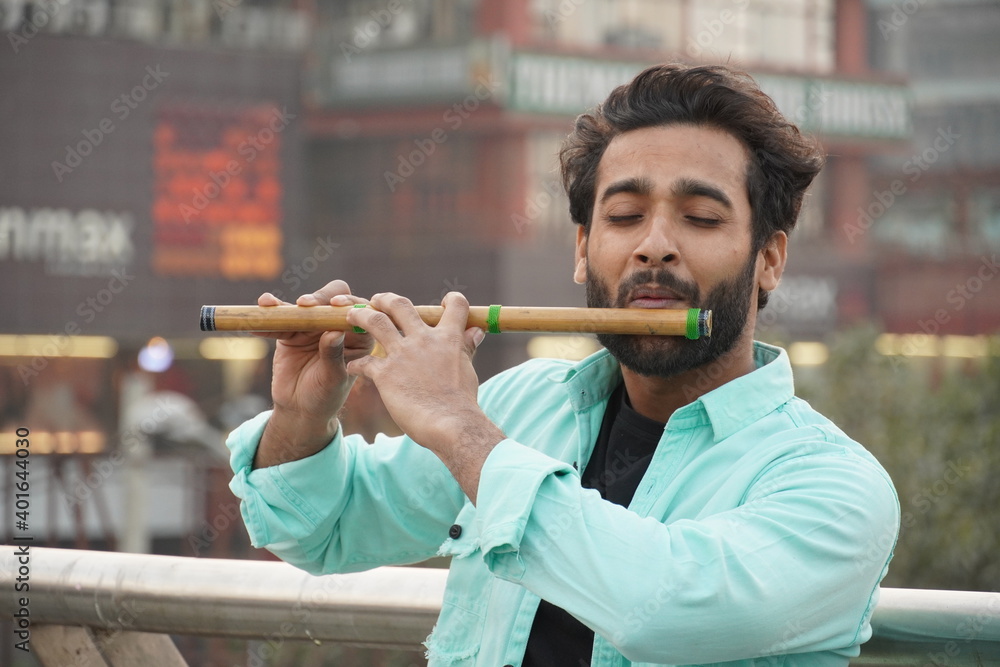 Indian man playing bansuri Indian Bamboo Flute Stock Photo Adobe Stock
