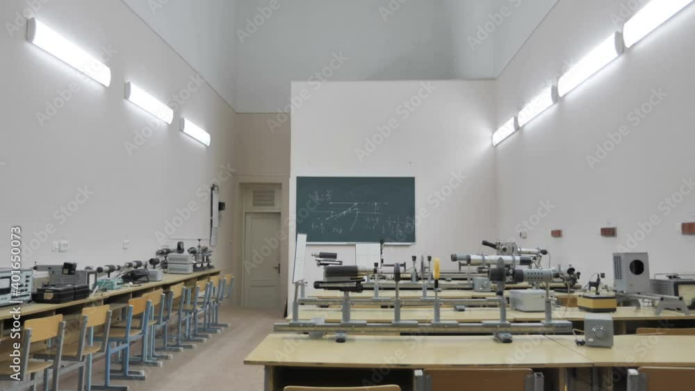 Empty Chairs And Tables In Physics Classroom Empty Chairs And Tables In Physics Classroom