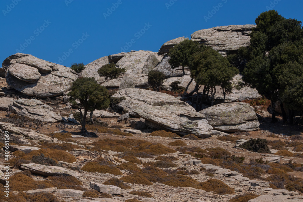 barren lunar landscape with bizarre rock formations at the Pezi plateau, Ikaria, Greece