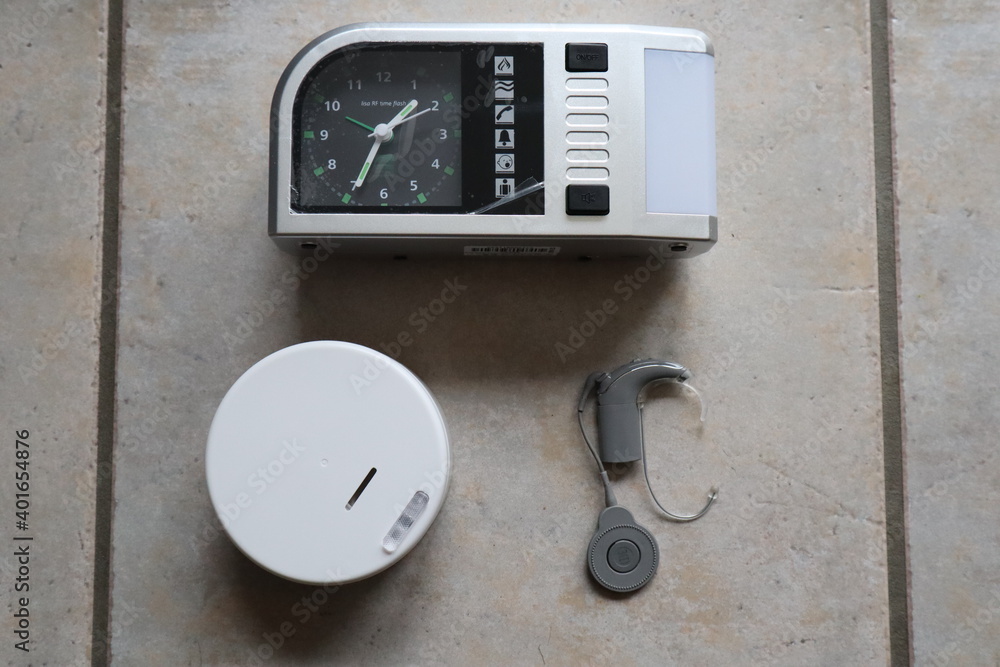 cochlear implant with fire alarm close up, therapy, hearing aid