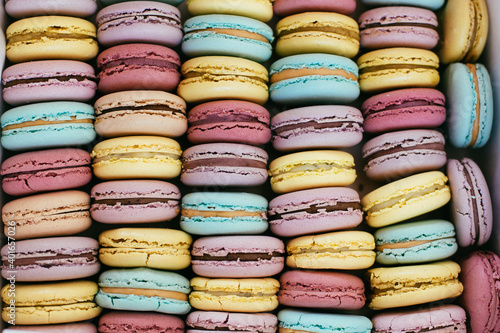 colorful macaroons on a wooden table