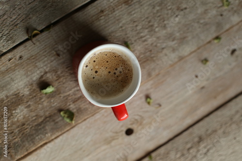 cup of coffee on wooden table