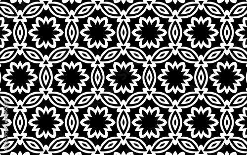 Ethnic art black and white pattern. Geometric background of flowers and polygons in traditional folk style for wallpaper, website, coloring book.