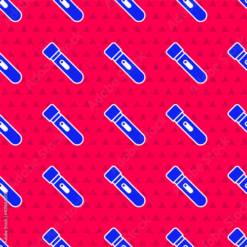 Blue Flashlight icon isolated seamless pattern on red background. Vector.