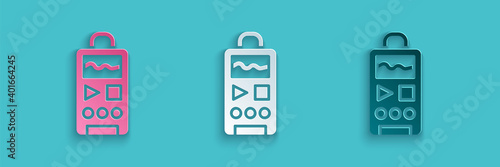 Paper cut Dictaphone icon isolated on blue background. Voice recorder. Paper art style. Vector.