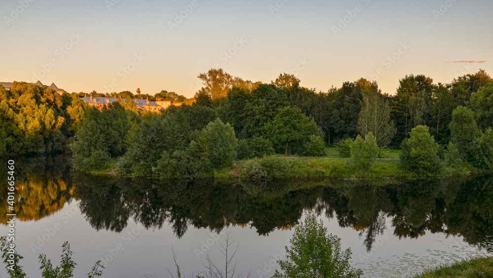 scenic view of Lovat river and Dyatlinka island from rampart of Velikolukskaya fortress (Pskov region, Russia)  - obrazy, fototapety, plakaty 