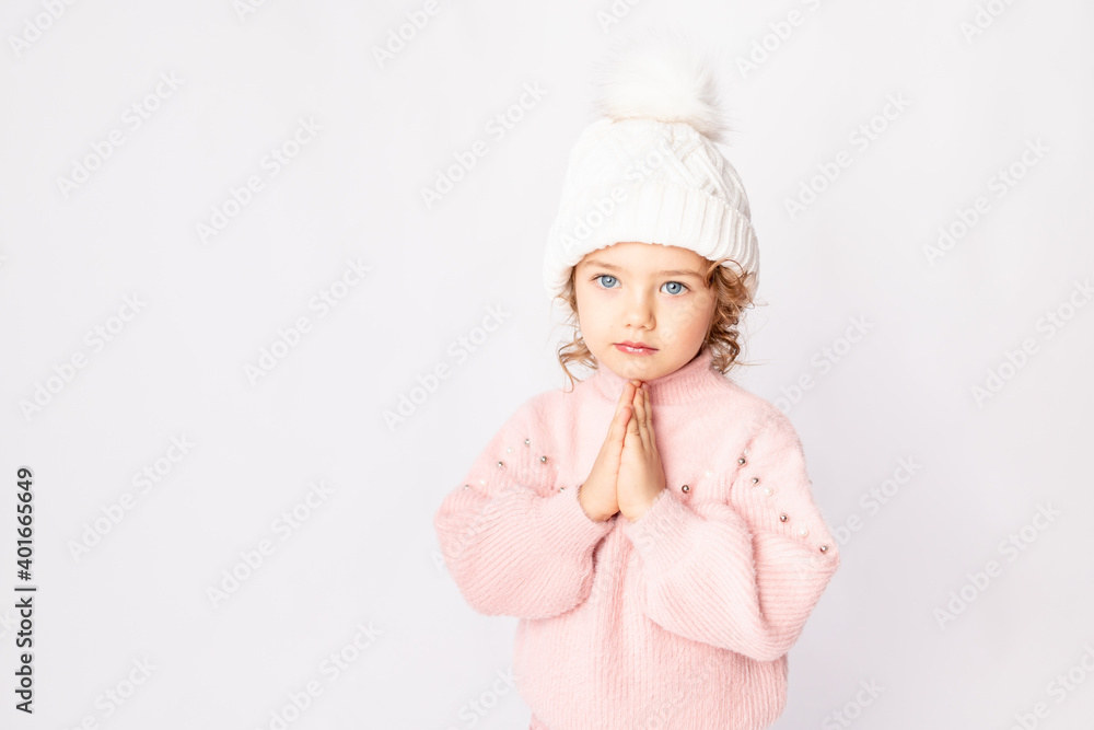cute baby girl in pink winter clothes on white background, space for text cute baby girl in pink winter clothes on white background, space for text