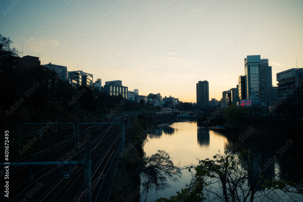 Sunset in the city where the river flows