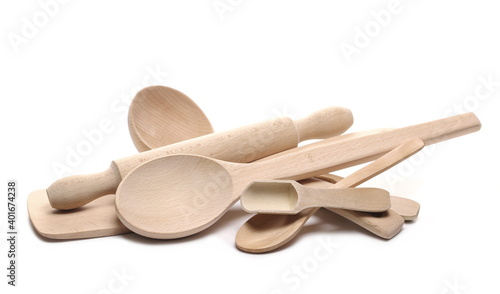 Wooden spoon, ladle and rolling pin isolated on white background 