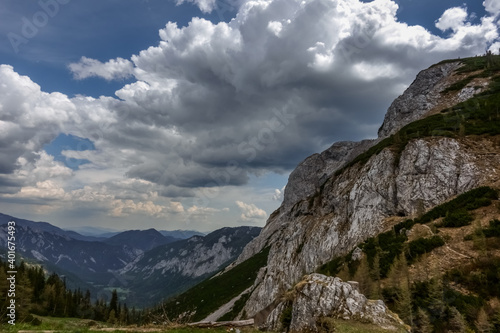 nice rocks and mountains with wide view and white clouds © thomaseder