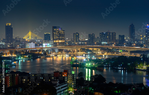 Night view of Bangkok city and Bangkok Bridge over Chao Phraya River