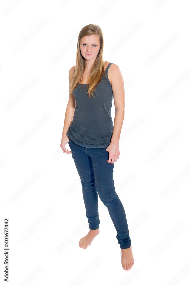 Full length portrait of a beautiful young woman wearing blue jeans and gray shirt, isoltated on white studio background Full length portrait of a beautiful young woman wearing blue jeans and gray shirt, isoltated on white studio background