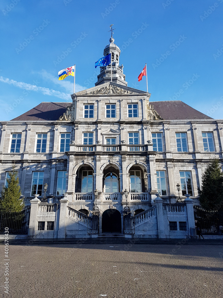 Cityhall in Maastricht town under blue sky