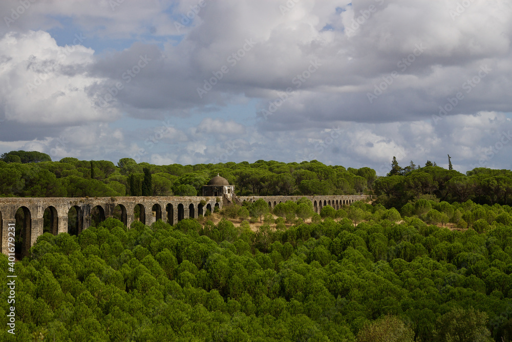 Impressive 17th century built Aqueduct for transporting of water from Pegoes springs to Convent of Christ, Tomar, Portugal. Surrounded by lush green forests. Influenced- Roman and Muslim architecture.