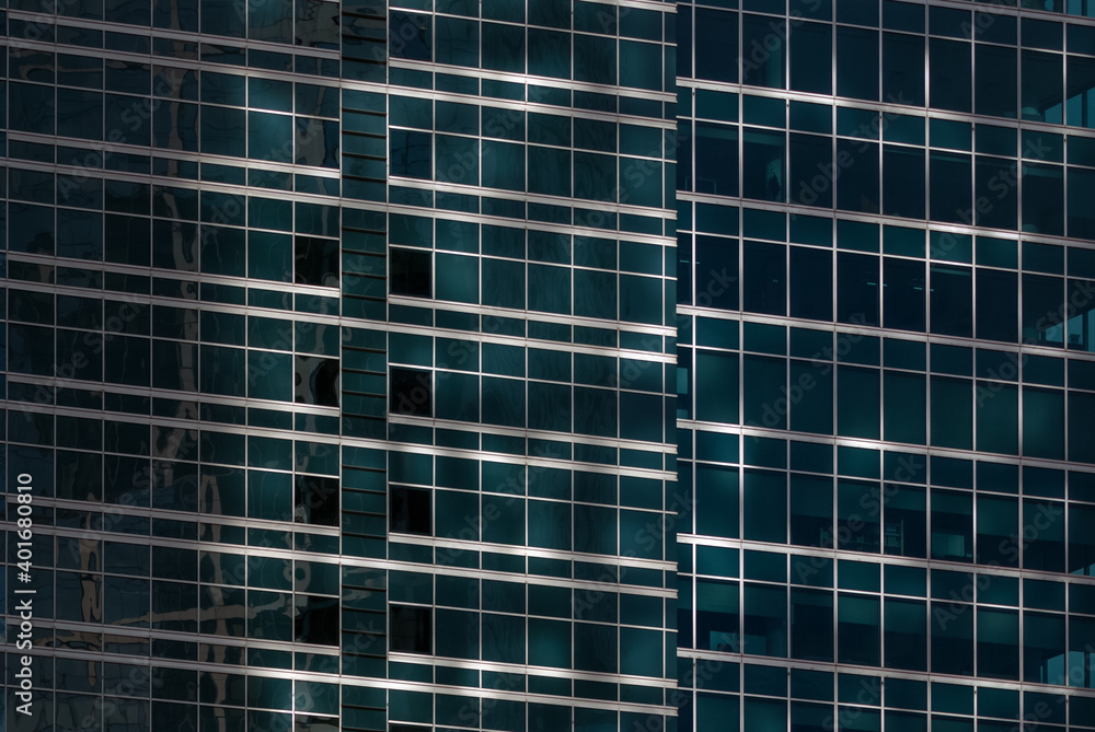 Modern architecture texture - dark blue-green building exterior of glass and steel Modern architecture texture - dark blue-green building exterior of glass and steel