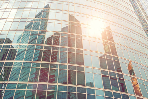 Photography Reflection of modern skyscrapers lit by sun, Moscow city towers overall view