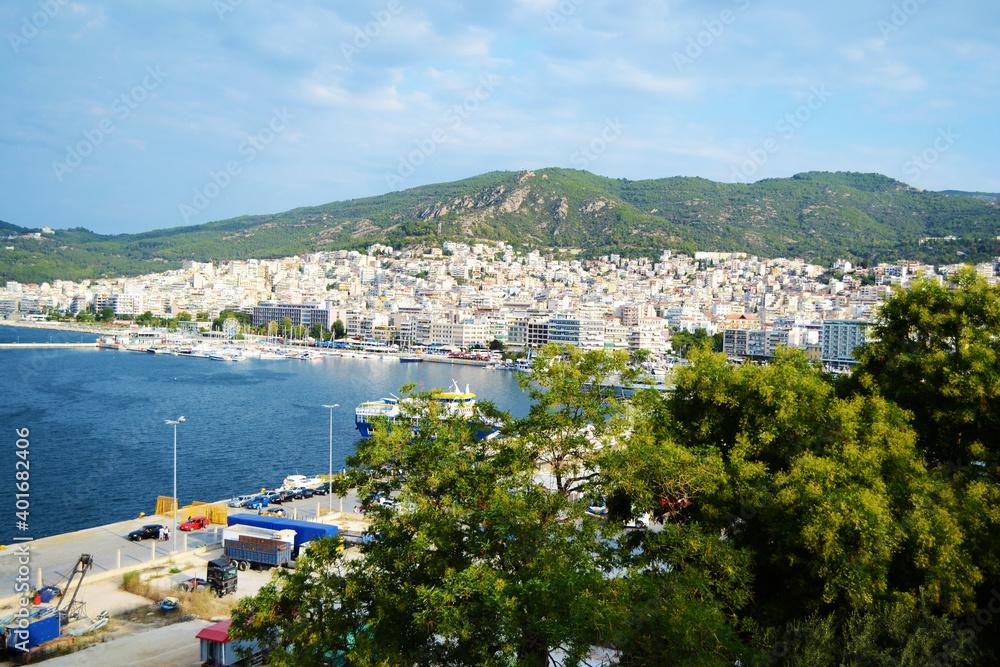 Fototapeta premium Ferry anchored in the port. Panoramic view of the port and the city of Kavala. Greece.