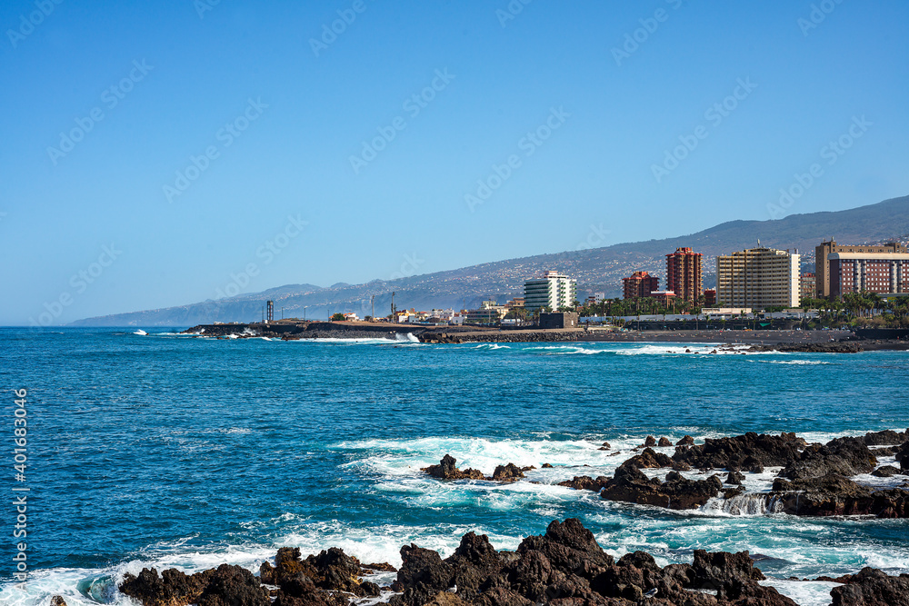 Panoramic view of Puerto de la Cruz with Jardin beach on a sunny day. Canary Islands.
