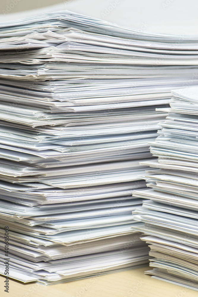 bundles bales of paper documents. stacks packs pile on the desk in the office bundles bales of paper documents. stacks packs pile on the desk in the office