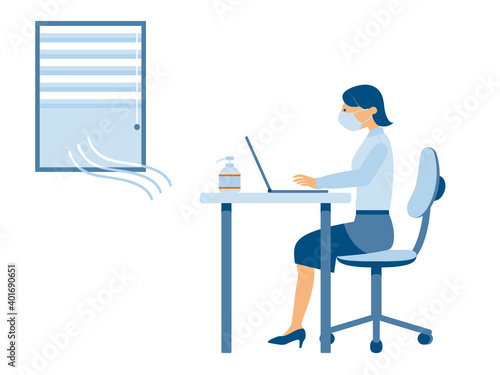 感染対策をしてデスクワークをする女性（シンプルカラー）