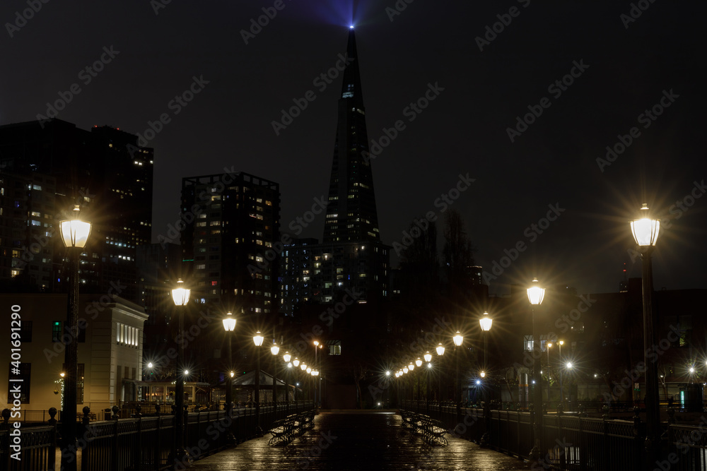 Rainy Night over Pier 7 at the Embarcadero in San Francisco, California, USA.