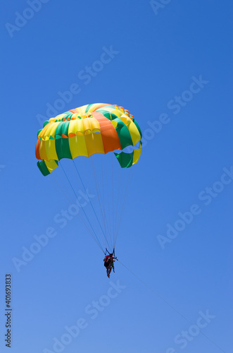 Parasailing in the blue sky