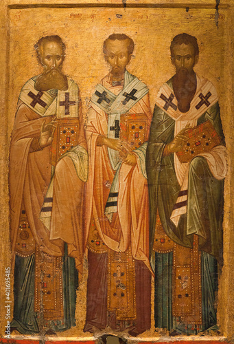 Ancient icon of the Three Hierarchs, church fathers - Basil the Great,  Gregory the Theologian and John Chrysostom. Thessaloniki, Greece, 14th cent.