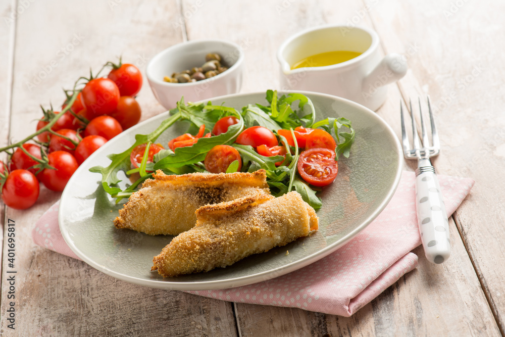 rolled sword fish with capers arugula and tomatoes salad rolled sword fish with capers arugula and tomatoes salad