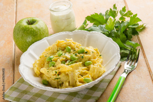 pasta wtih edamame apple cream sauce and parmesan cheese