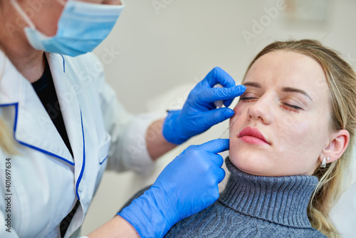 Woman has injections.Cosmetology and skincare.Plastic surgery clinic
